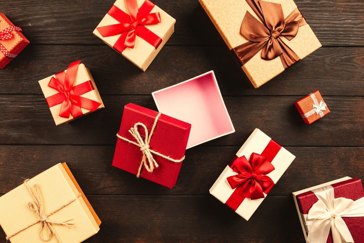 Small wrapped gift boxes with ribbon